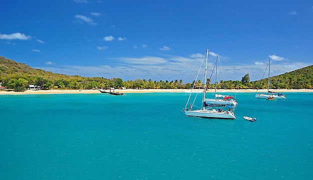 A peaceful charter yacht anchorage at Canouan Island,St Vincent and the Grenadines